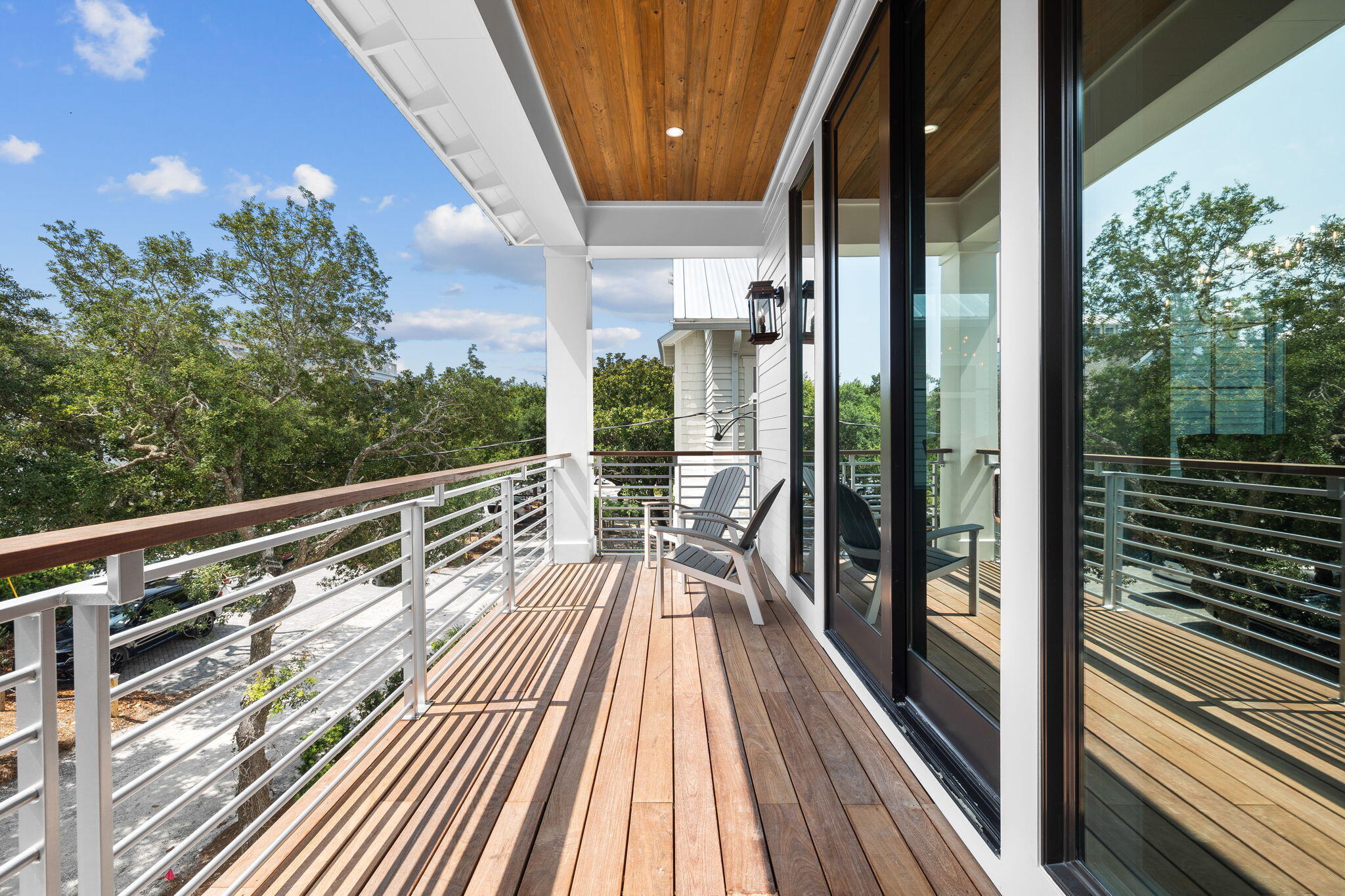 57 Azalea Street Santa Rosa Beach, FL 32459 - Photo 33 of 66 a view of balcony with wooden floor and fence