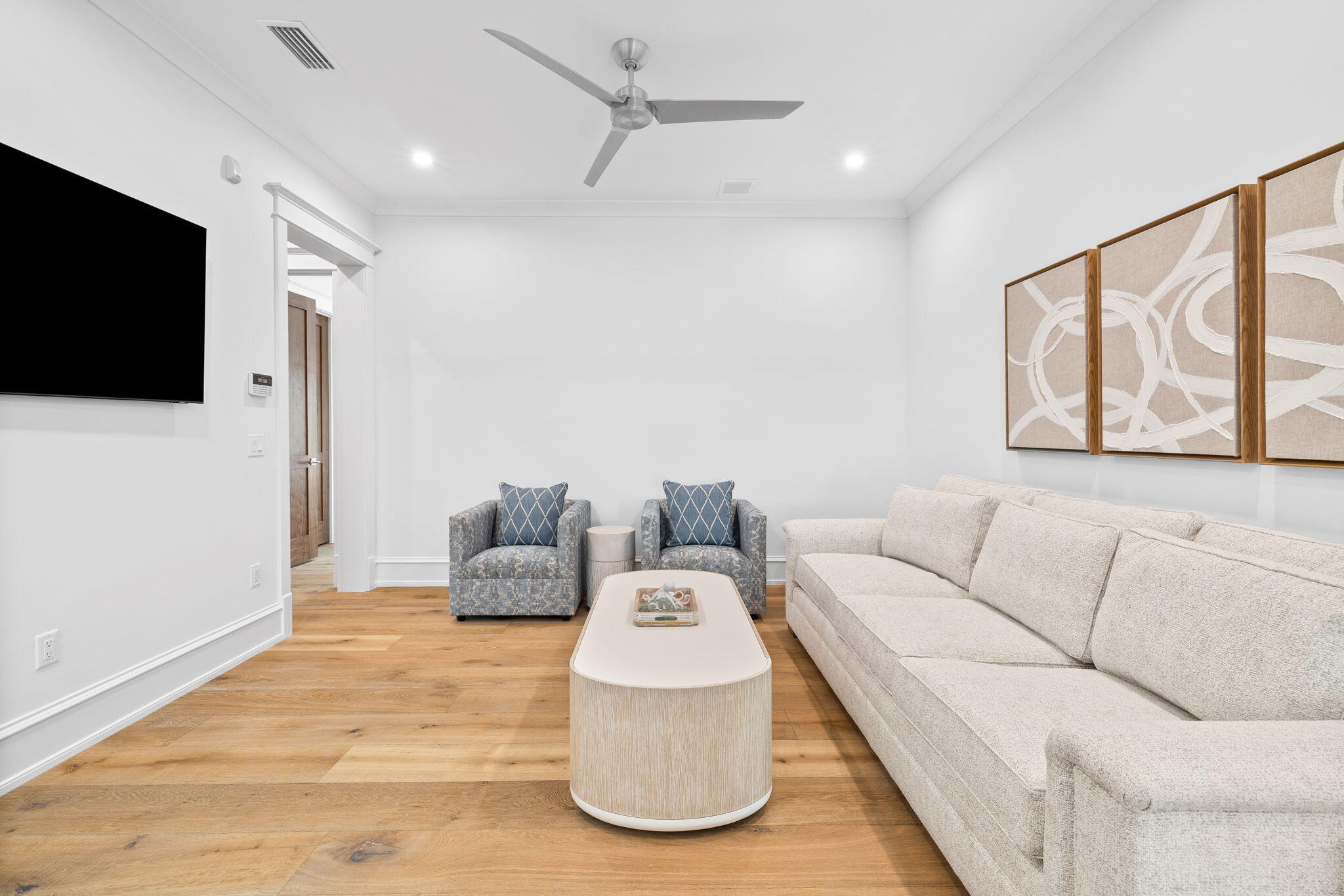 57 Azalea Street Santa Rosa Beach, FL 32459 - Photo 41 of 66 a living room with furniture and a flat screen tv