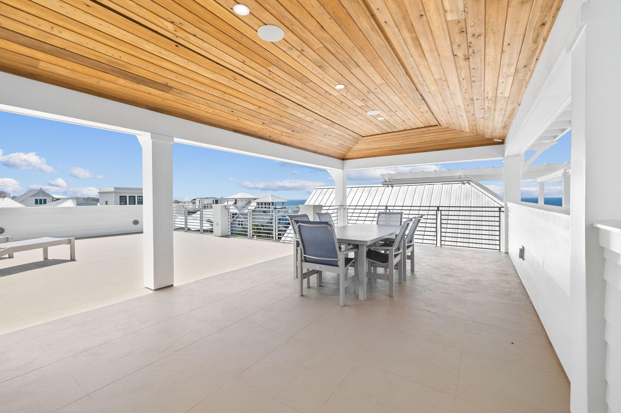 57 Azalea Street Santa Rosa Beach, FL 32459 - Photo 58 of 66 a dining room with furniture and a ceiling fan