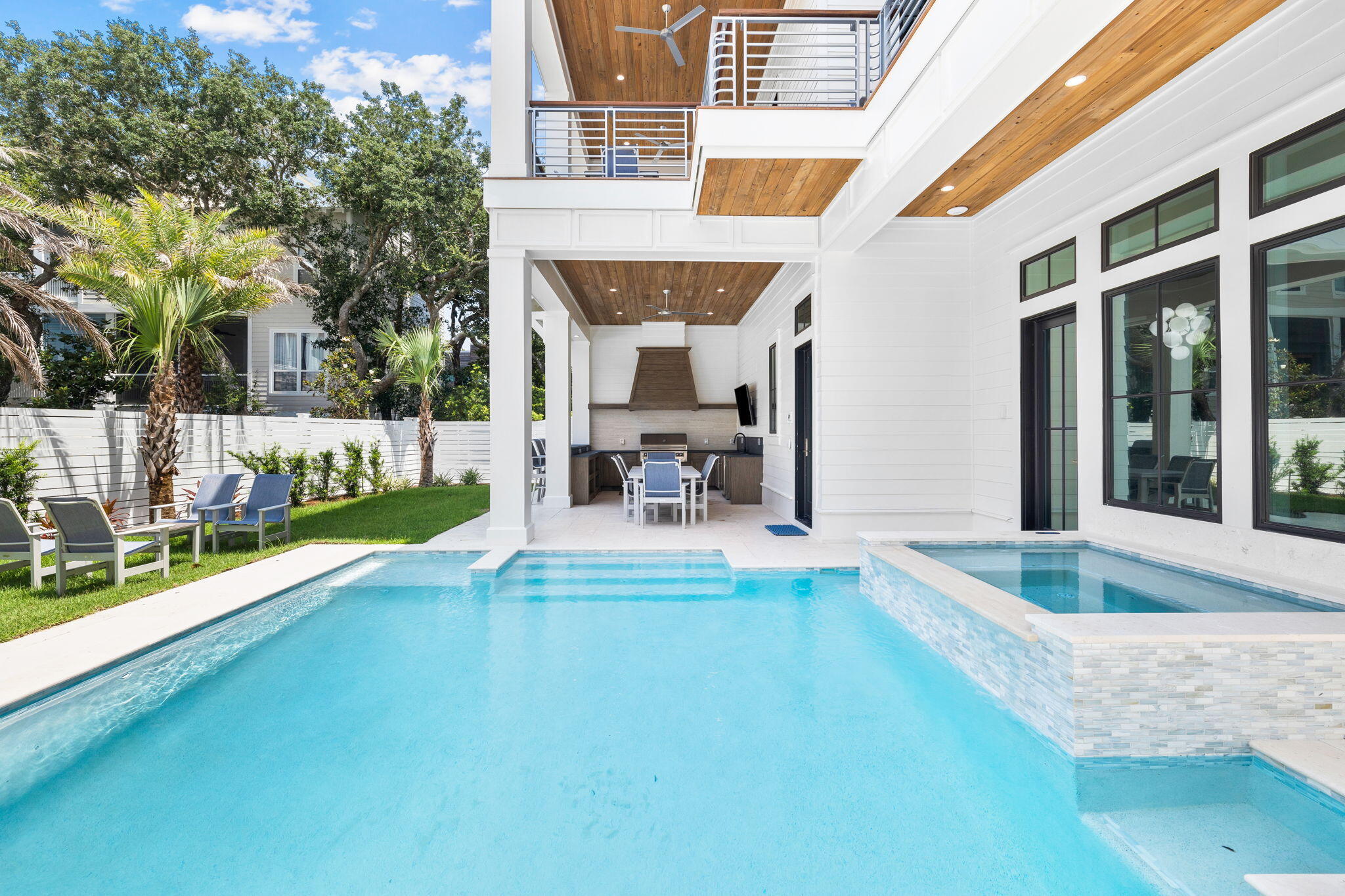 57 Azalea Street Santa Rosa Beach, FL 32459 - Photo 6 of 66 a view of a house with swimming pool and sitting area