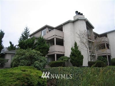 7577 Old Redmond Road, Unit 3 Redmond, WA 98052 - Photo 1 of 1 a view of a house with a yard