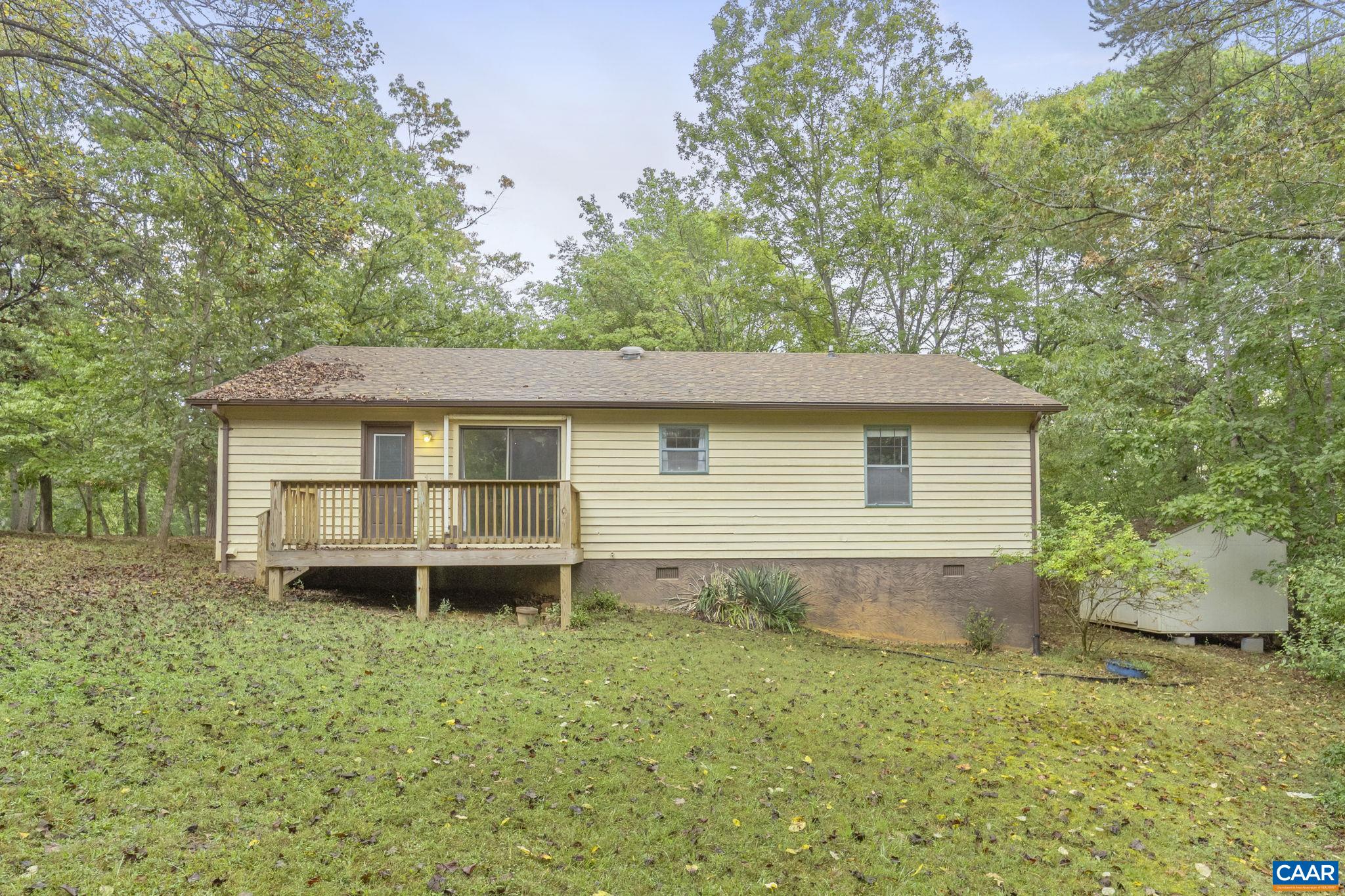 323 Jefferson Drive Palmyra, VA 22963 - Photo 24 of 27 front view of a house with a yard