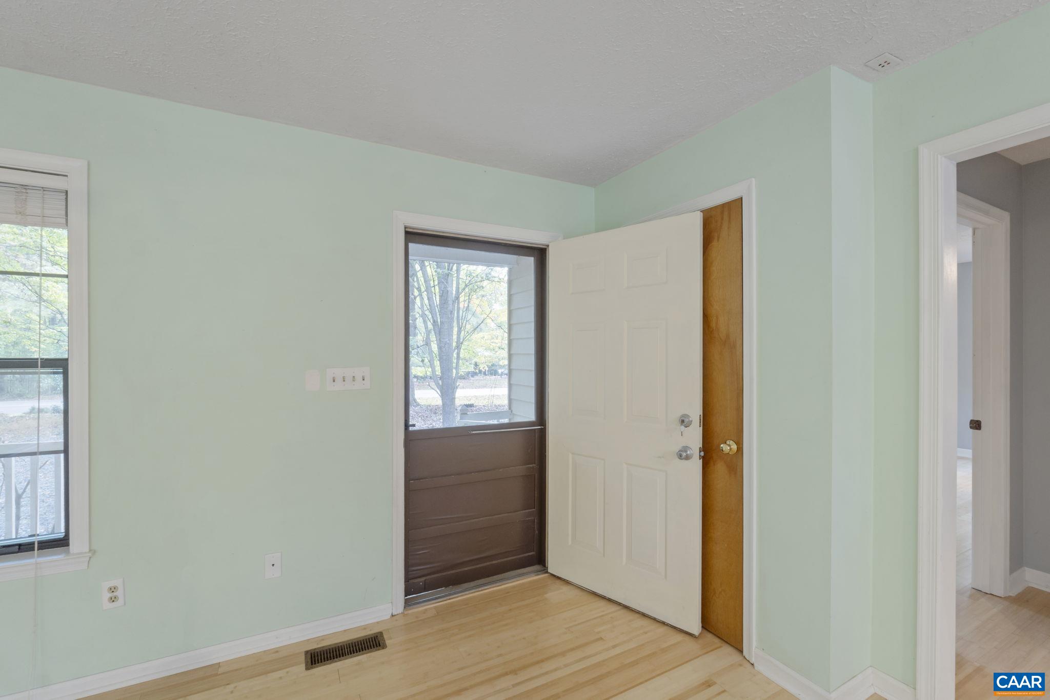 323 Jefferson Drive Palmyra, VA 22963 - Photo 6 of 27 a view of front door with wooden floor