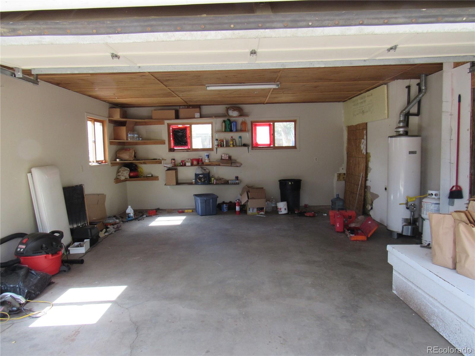 211 Sullivan Street Bailey, CO 80421 - Photo 7 of 15 a view of a room with workspace and windows