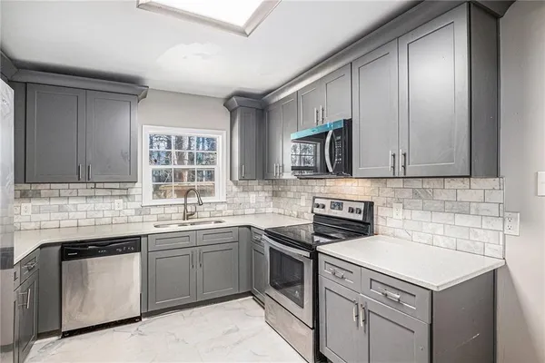 $394,000 | 4521 South Roberts Drive, Sugar Hill, GA 30518