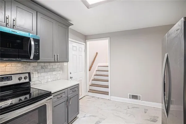 $394,000 | 4521 South Roberts Drive, Sugar Hill, GA 30518