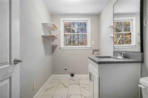 $394,000 | 4521 South Roberts Drive, Sugar Hill, GA 30518