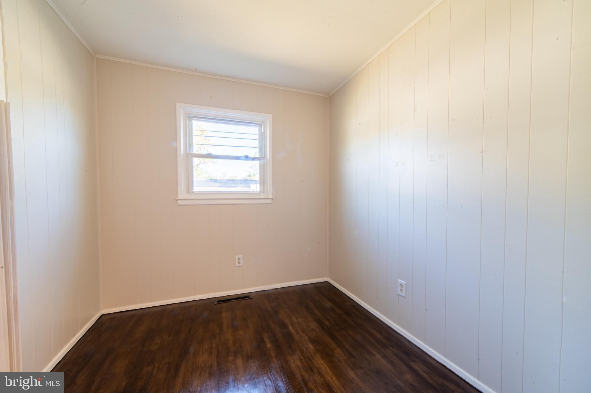 519 Berkeley Drive Browns Mills, NJ 08015 - Photo 16 of 25 a view of a room with wooden floor and window