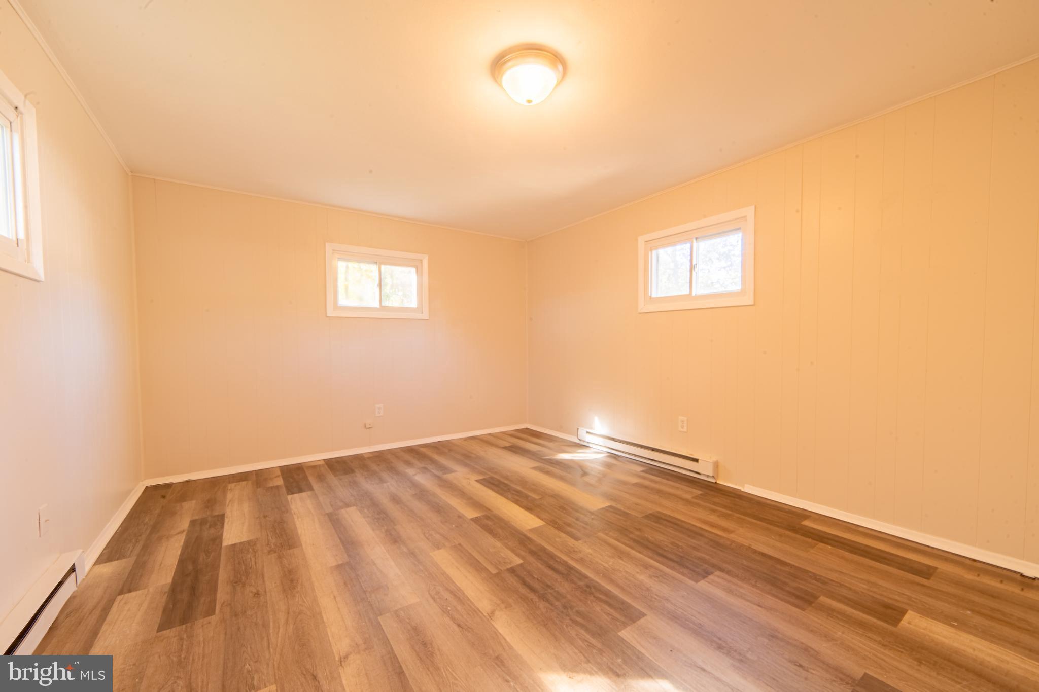 519 Berkeley Drive Browns Mills, NJ 08015 - Photo 25 of 25 a view of empty room with wooden floor