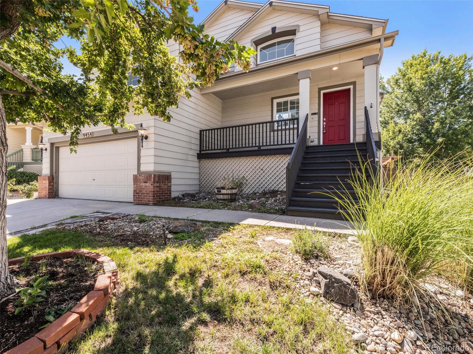 9454 Wolfe Place Highlands Ranch, CO 80129 - Photo 27 of 31 a view of a house with backyard