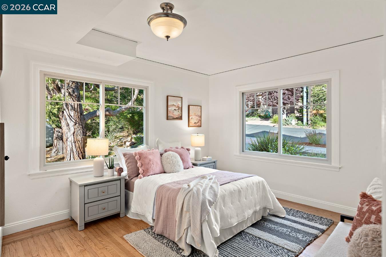 85 Ardmore Road Kensington, CA 94707 - Photo 35 of 45 a bedroom with a large bed and a window