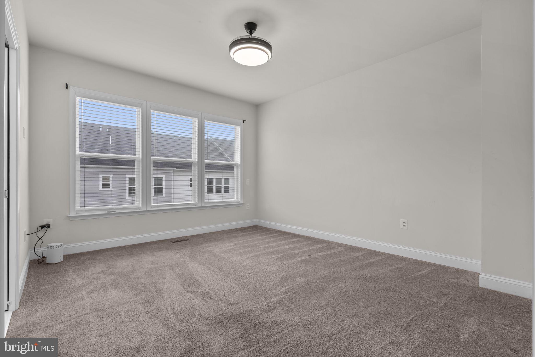 17357 Redshank Road Dumfries, VA 22026 - Photo 18 of 29 an empty room with windows