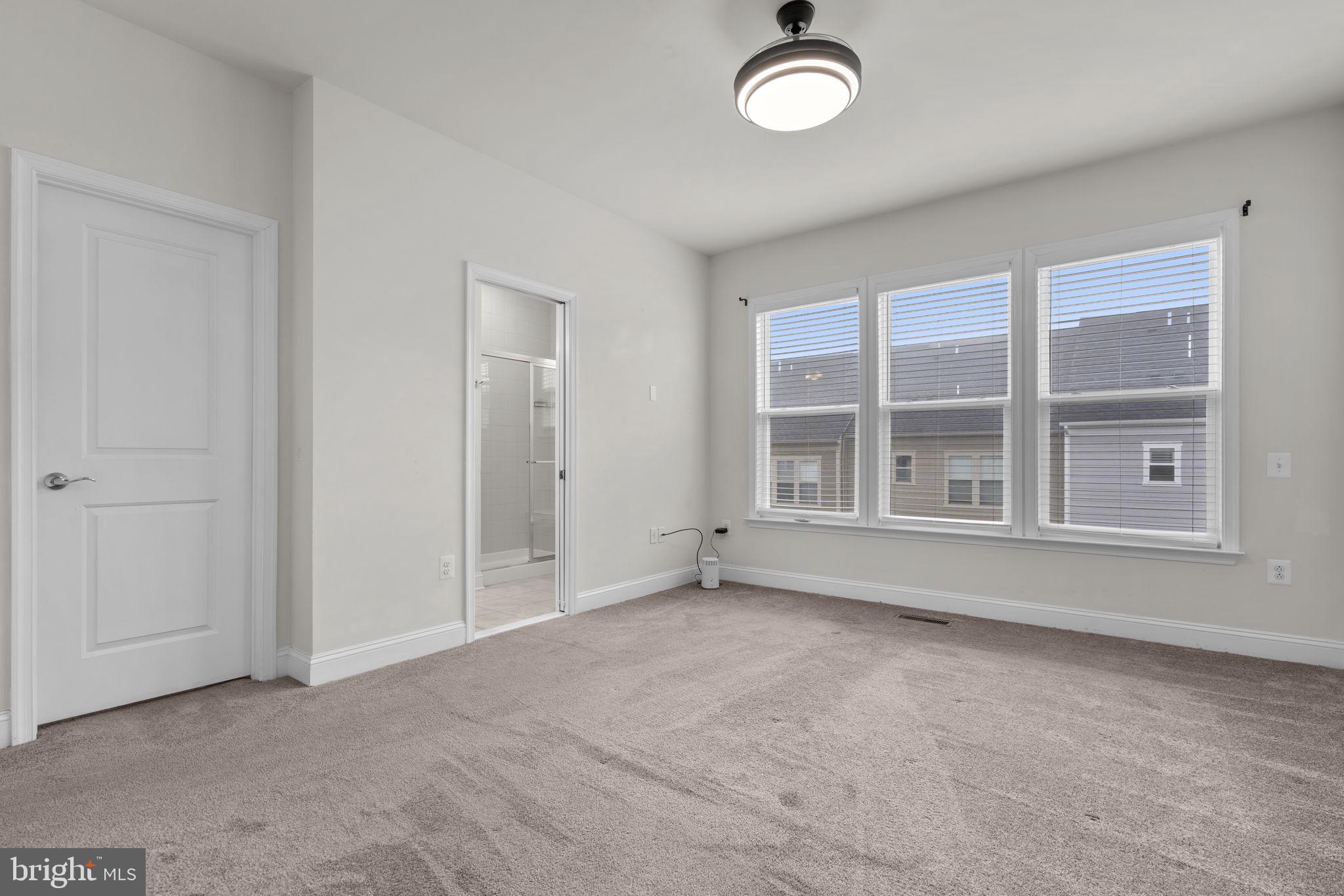 17357 Redshank Road Dumfries, VA 22026 - Photo 19 of 29 an empty room with windows