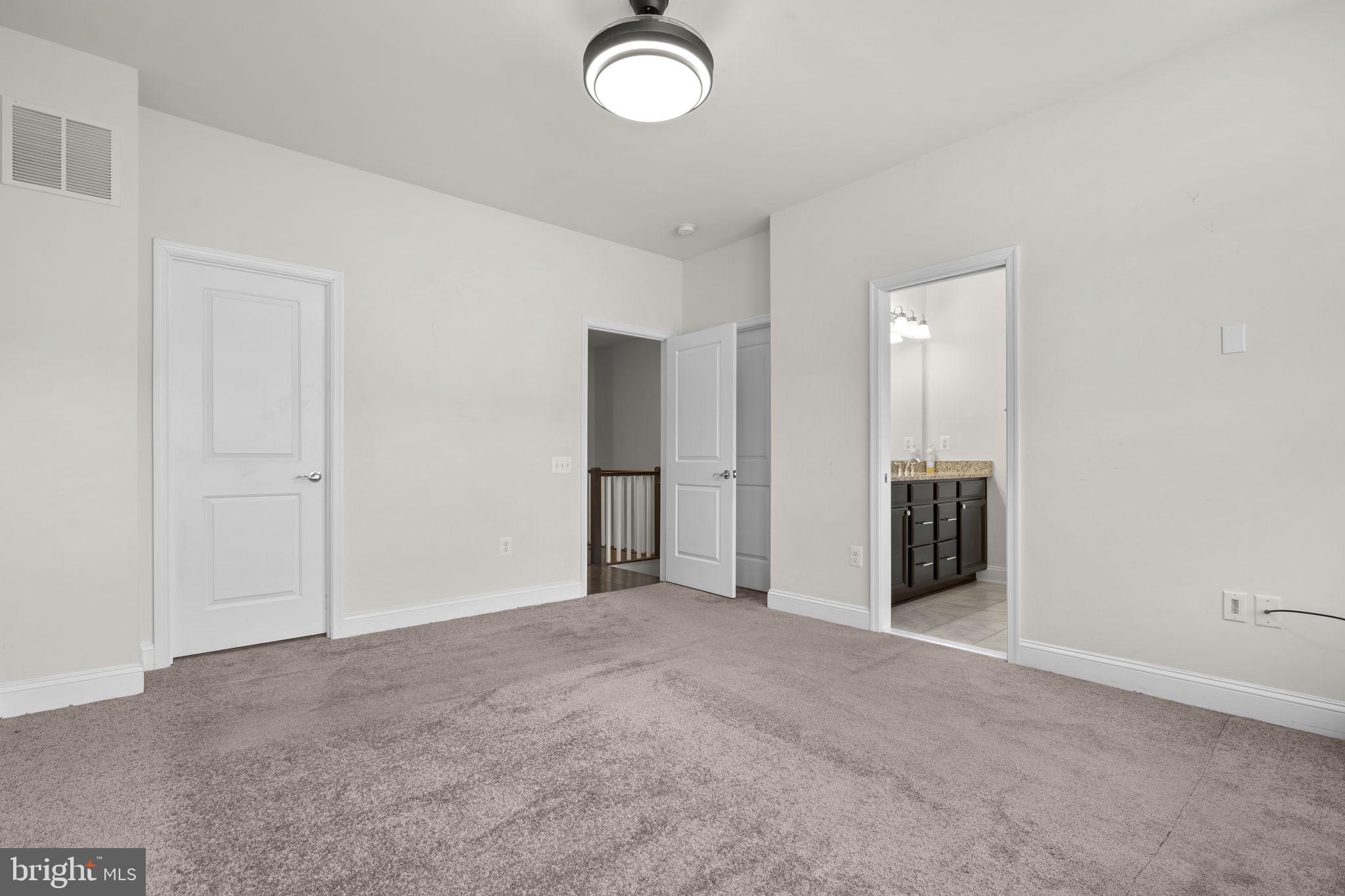 17357 Redshank Road Dumfries, VA 22026 - Photo 20 of 29 a view of an empty room with a window