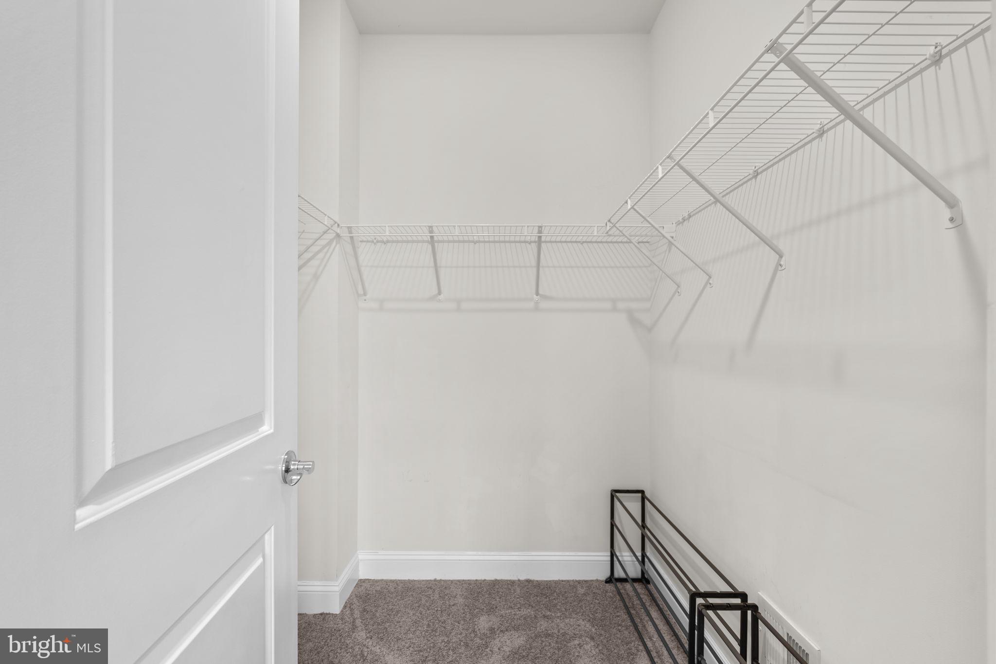 17357 Redshank Road Dumfries, VA 22026 - Photo 21 of 29 a view of a hallway with staircase