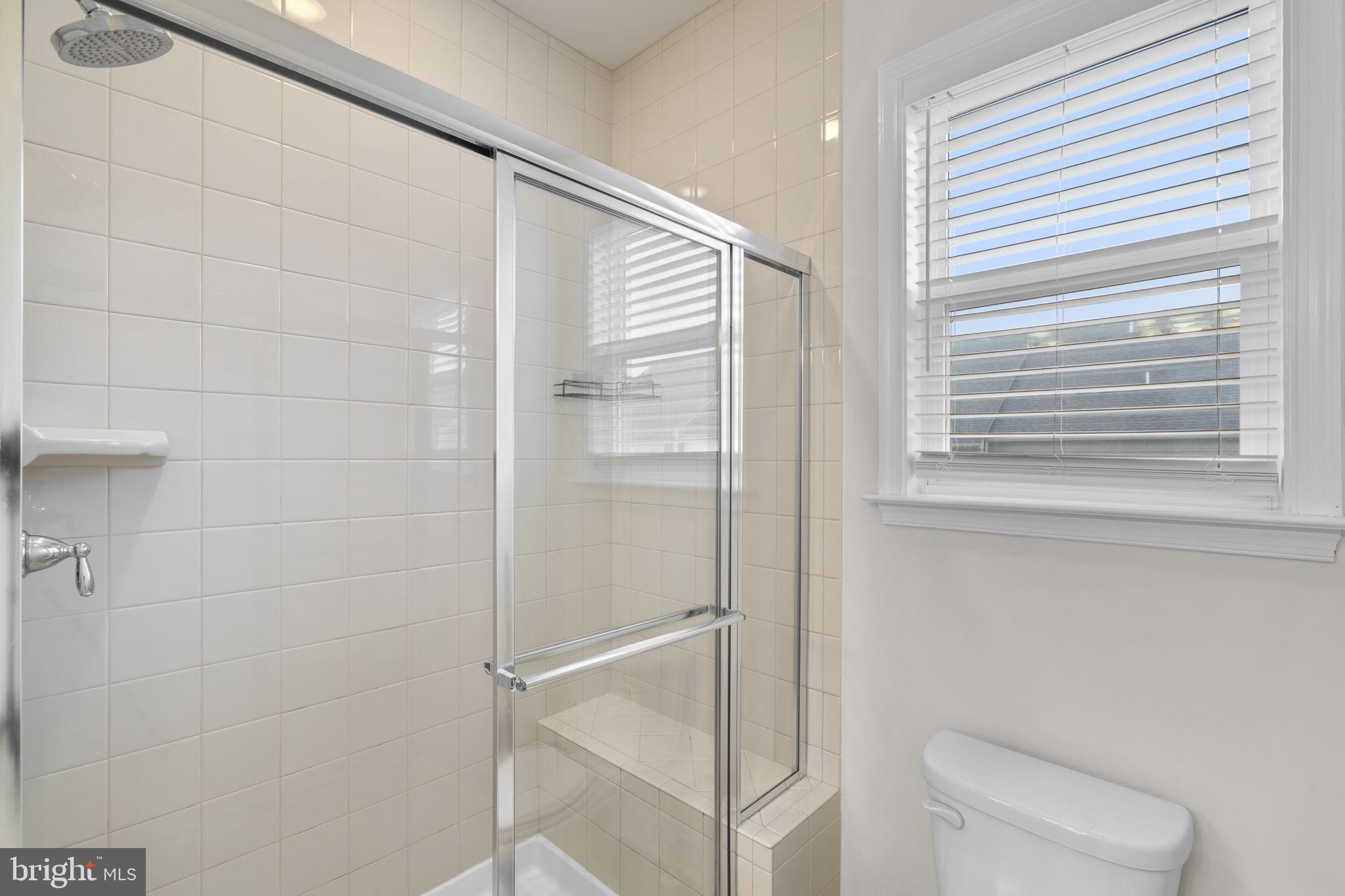 17357 Redshank Road Dumfries, VA 22026 - Photo 23 of 29 a bathroom with a shower and a toilet
