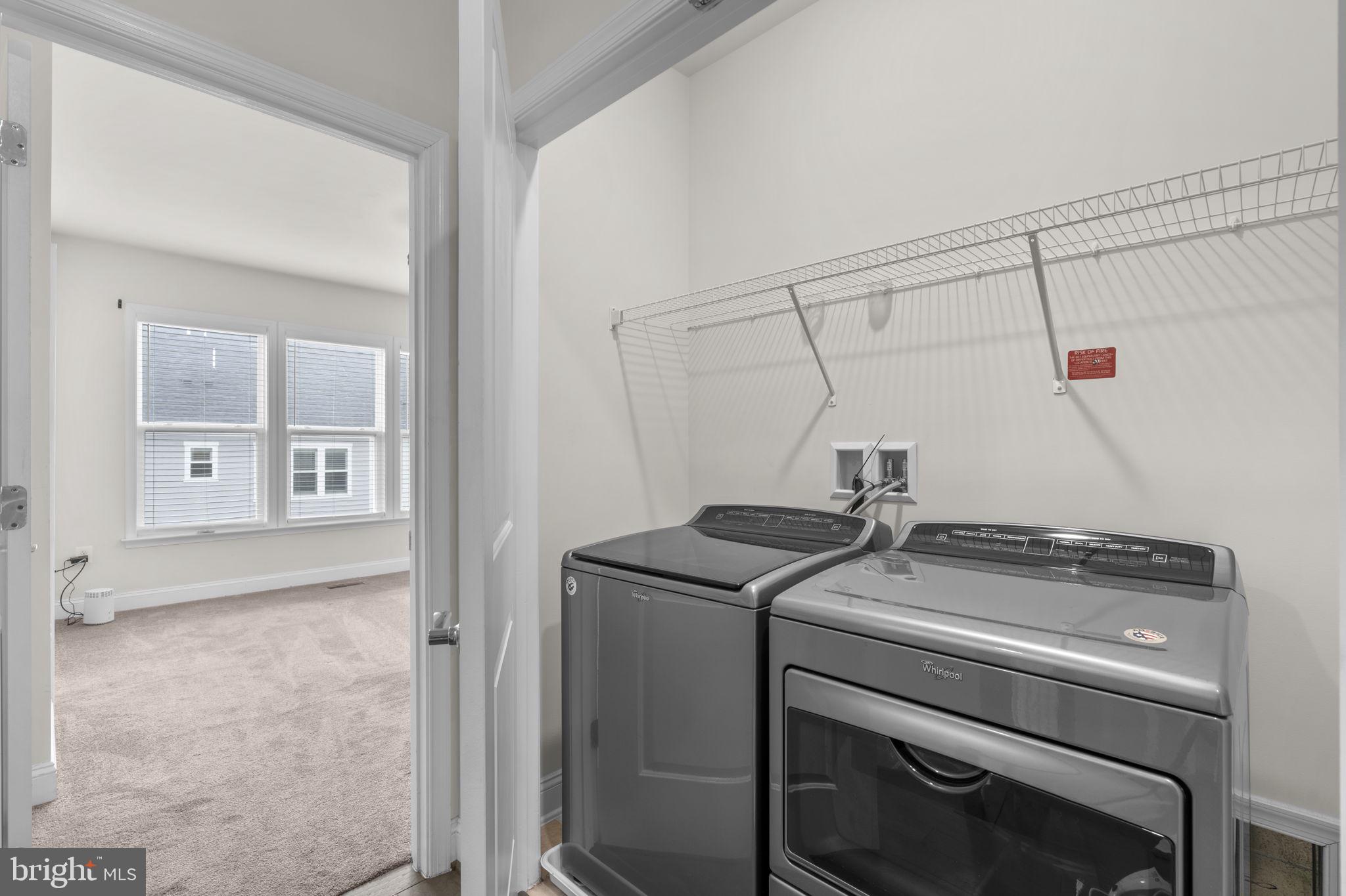 17357 Redshank Road Dumfries, VA 22026 - Photo 24 of 29 a utility room with dryer and washer