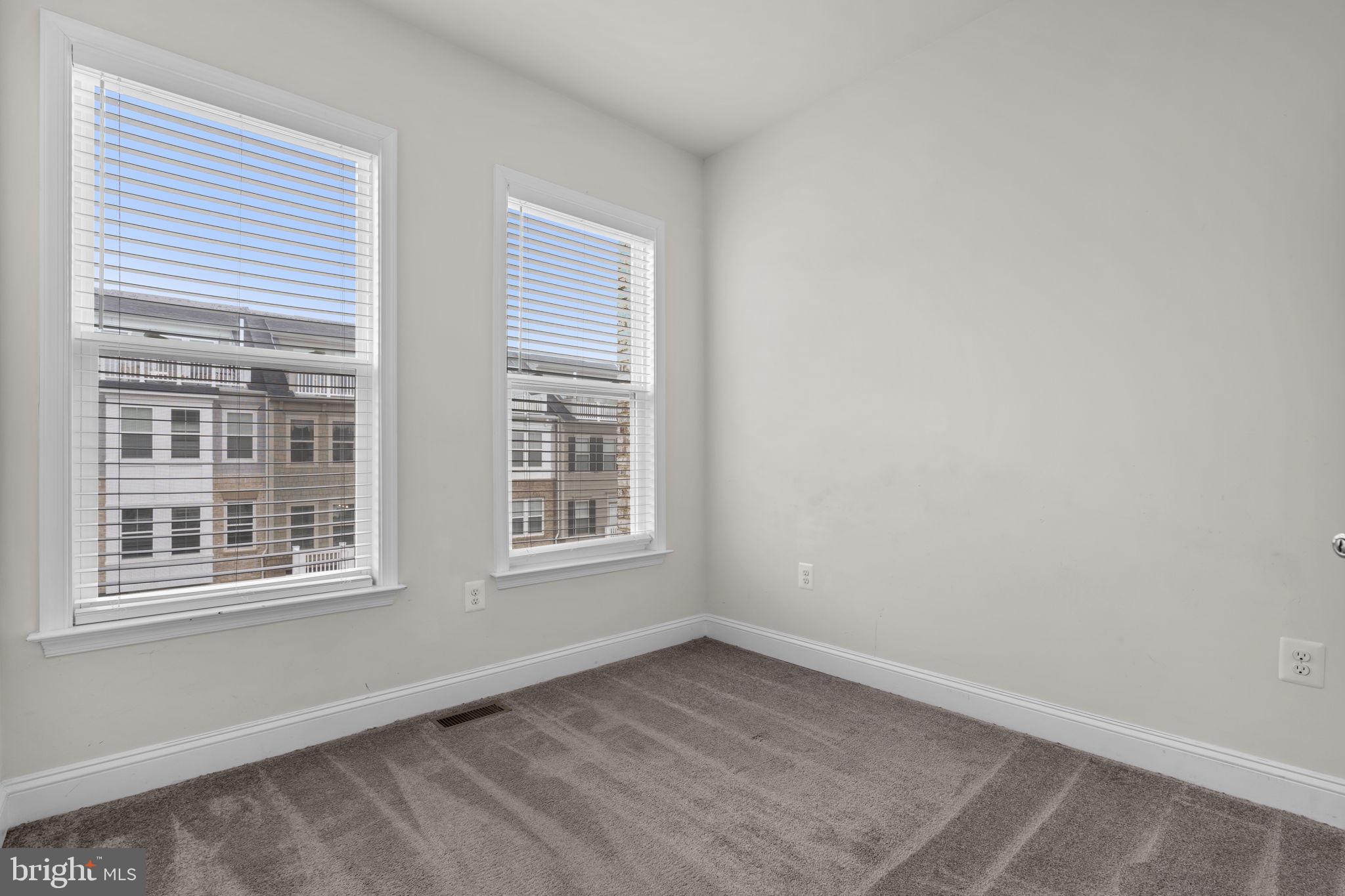 17357 Redshank Road Dumfries, VA 22026 - Photo 26 of 29 a view of an empty room with a window