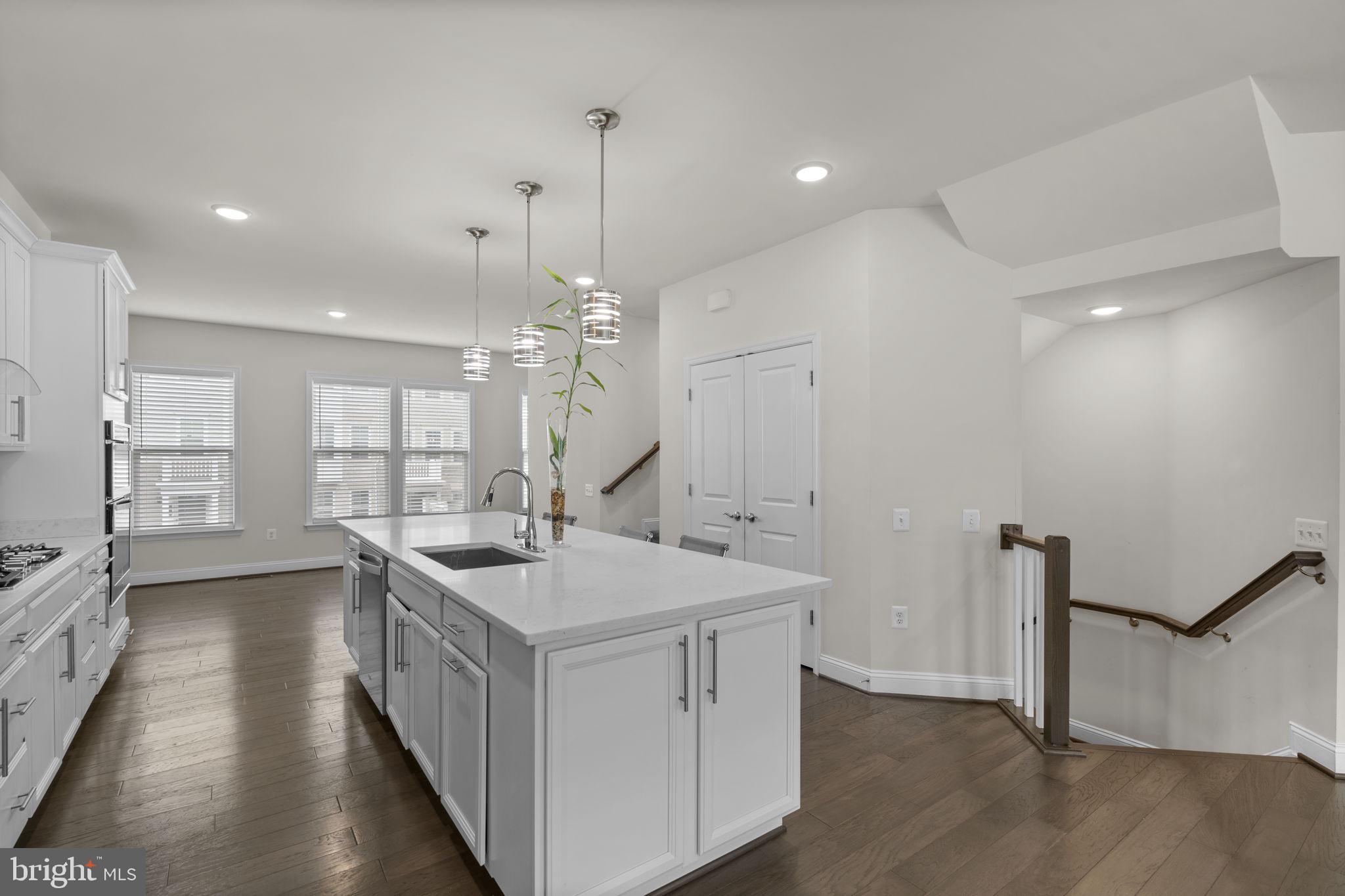 17357 Redshank Road Dumfries, VA 22026 - Photo 9 of 29 a kitchen with sink stove and refrigerator