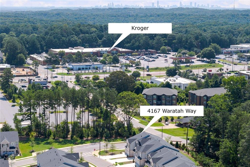 4167 Waratah Way Mableton, GA 30126 - Photo 29 of 32 a picture of houses with outdoor space and swimming pool