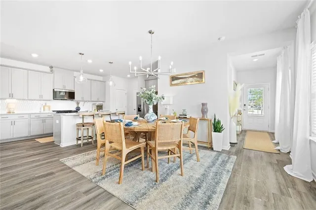 a view of a dining room with furniture