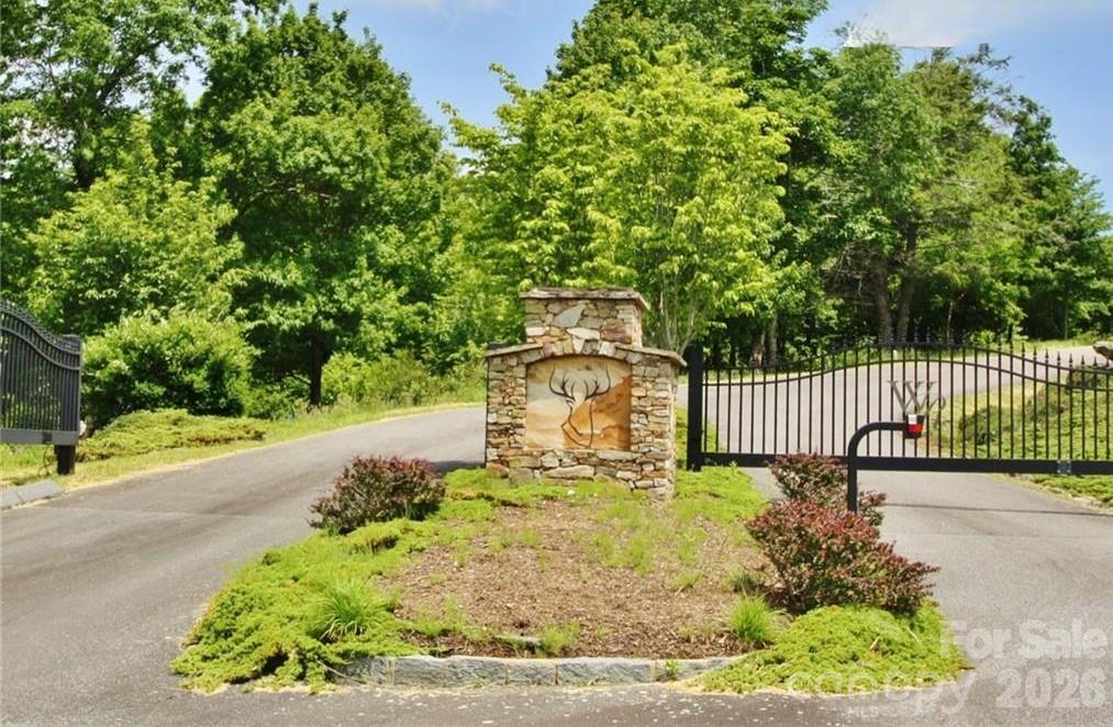 Tbd Wapiti Way, Unit 5 Boone, NC 28607 - Photo 13 of 13 a view of a pathway with a garden