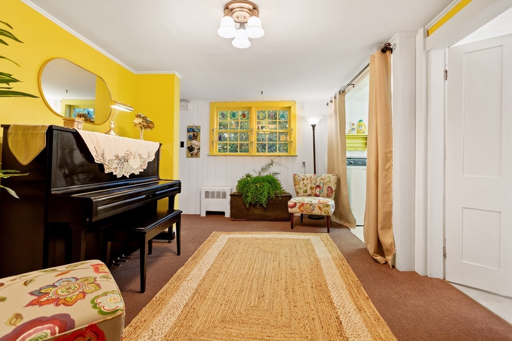 26 Coggeshall Road Gloucester, MA 01930 - Photo 11 of 37 a living room with furniture