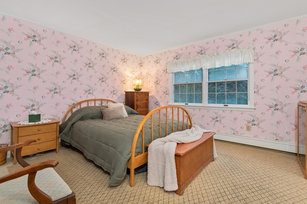 26 Coggeshall Road Gloucester, MA 01930 - Photo 16 of 37 a bedroom with furniture and window