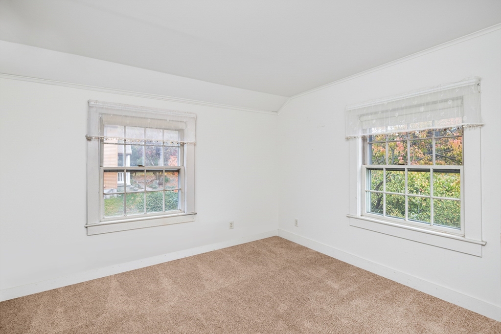 26 Coggeshall Road Gloucester, MA 01930 - Photo 20 of 37 an empty room with a window