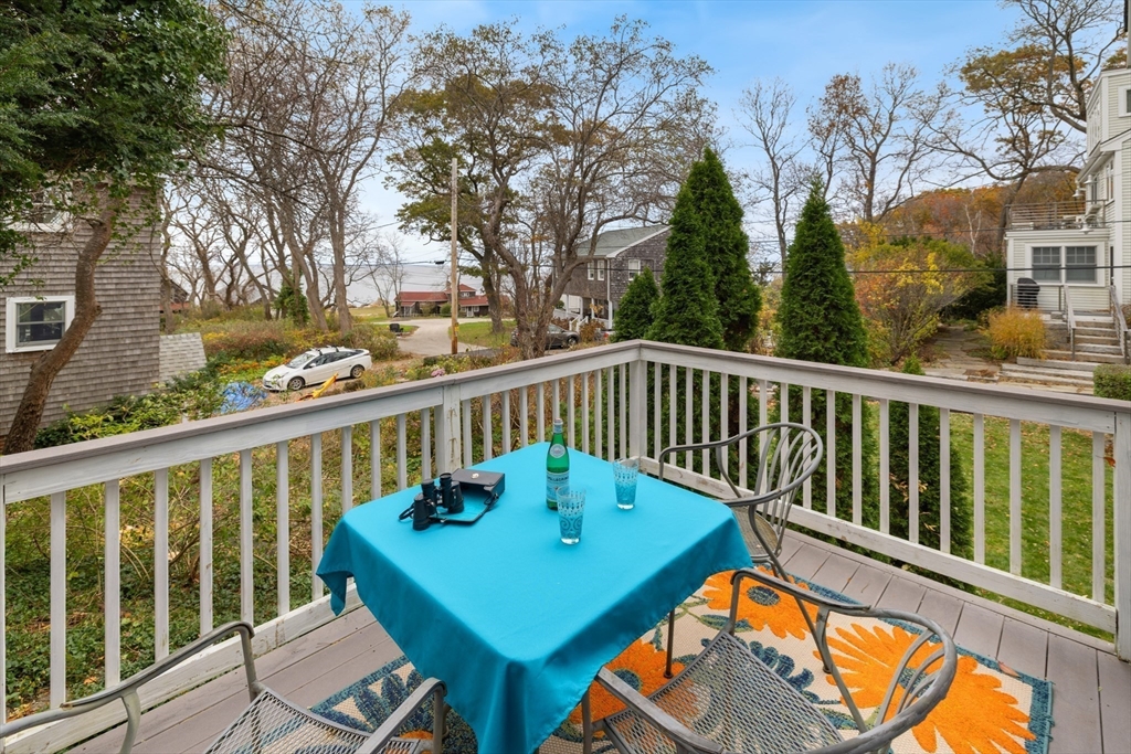 26 Coggeshall Road Gloucester, MA 01930 - Photo 23 of 37 a view of a two chairs in the deck