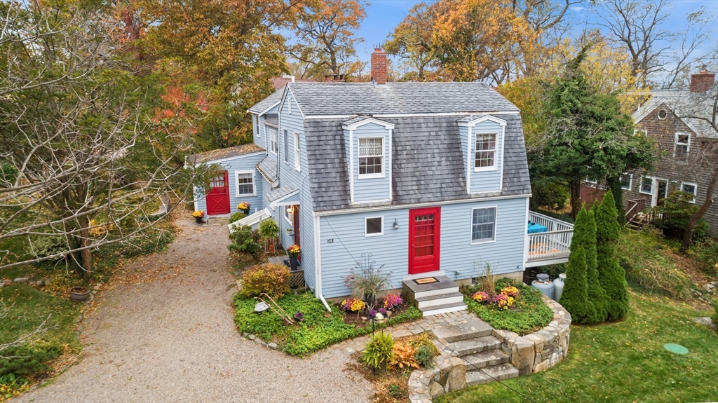 26 Coggeshall Road Gloucester, MA 01930 - Photo 24 of 37 a front view of a house with a yard