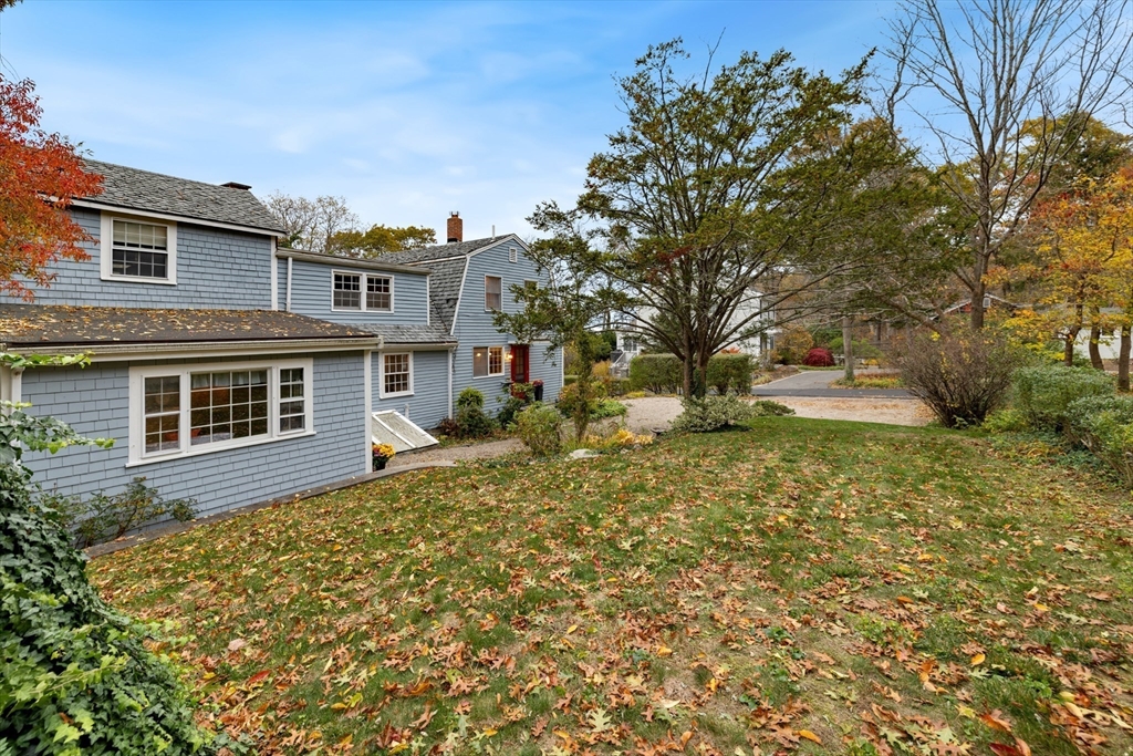 26 Coggeshall Road Gloucester, MA 01930 - Photo 26 of 37 a front view of a house with a yard