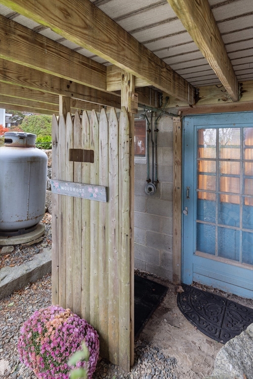 26 Coggeshall Road Gloucester, MA 01930 - Photo 27 of 37 a walk in closet with wooden floor