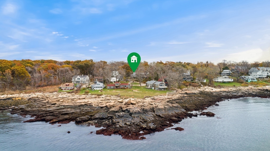 26 Coggeshall Road Gloucester, MA 01930 - Photo 35 of 37 a view of a field of mountains and a lake