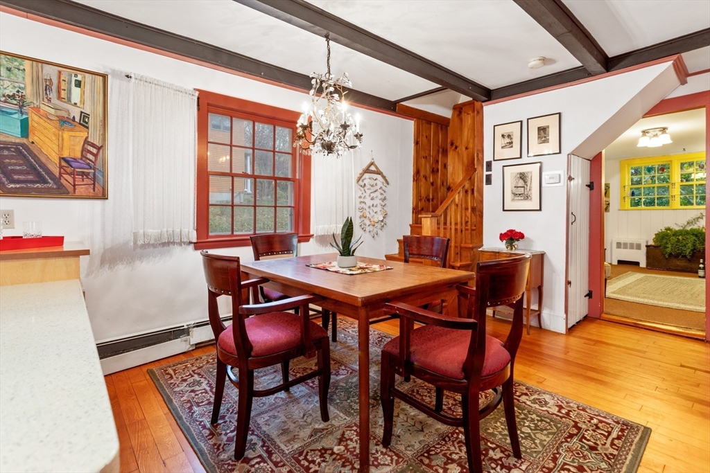 26 Coggeshall Road Gloucester, MA 01930 - Photo 10 of 37 a view of a dining room with furniture and wooden floor