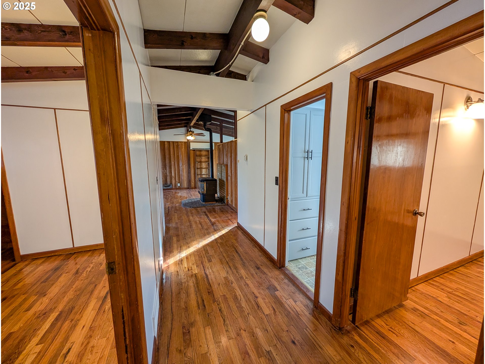 1106 F Avenue La Grande, OR 97850 - Photo 13 of 18 a view of a hallway with wooden floor