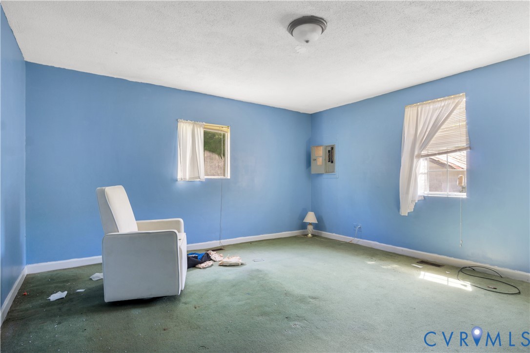 5134 Beechland Road Elberon, VA 23846 - Photo 19 of 21 a room with a window and a couch