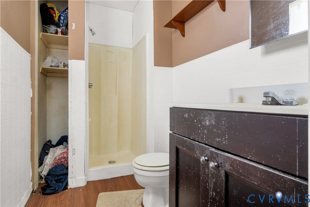 5134 Beechland Road Elberon, VA 23846 - Photo 21 of 21 a bathroom with a sink a toilet and shower