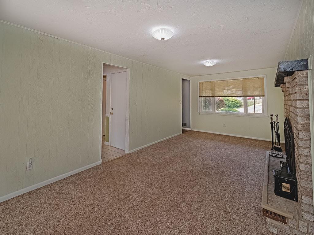 1749 Washington Road Apollo, PA 15613 - Photo 17 of 36 a view of room with window and a fireplace