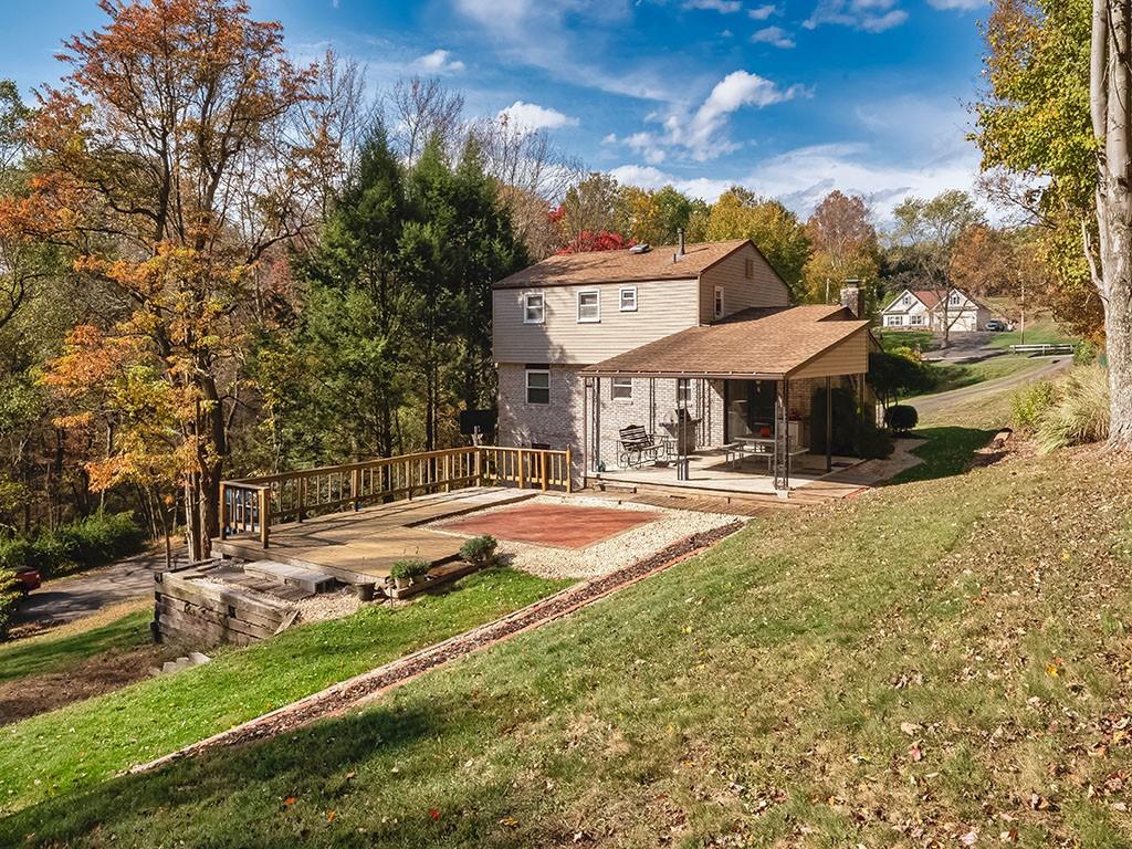 1749 Washington Road Apollo, PA 15613 - Photo 21 of 36 a view of a house with swimming pool and sitting area
