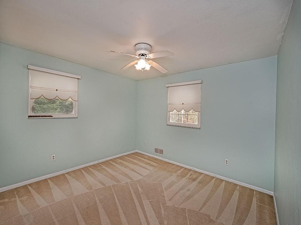 1749 Washington Road Apollo, PA 15613 - Photo 26 of 36 a view of a big room with closet and a ceiling fan