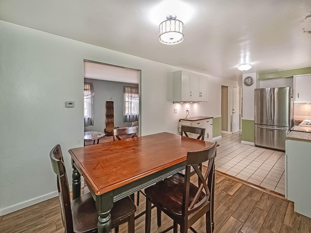 1749 Washington Road Apollo, PA 15613 - Photo 9 of 36 a kitchen with a table and chairs in it
