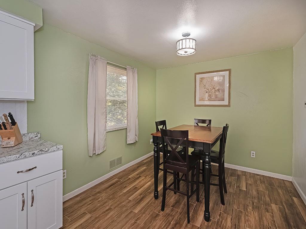 1749 Washington Road Apollo, PA 15613 - Photo 10 of 36 a view of a dining room with furniture and wooden floor