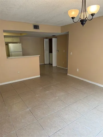 a view of a livingroom with a furniture