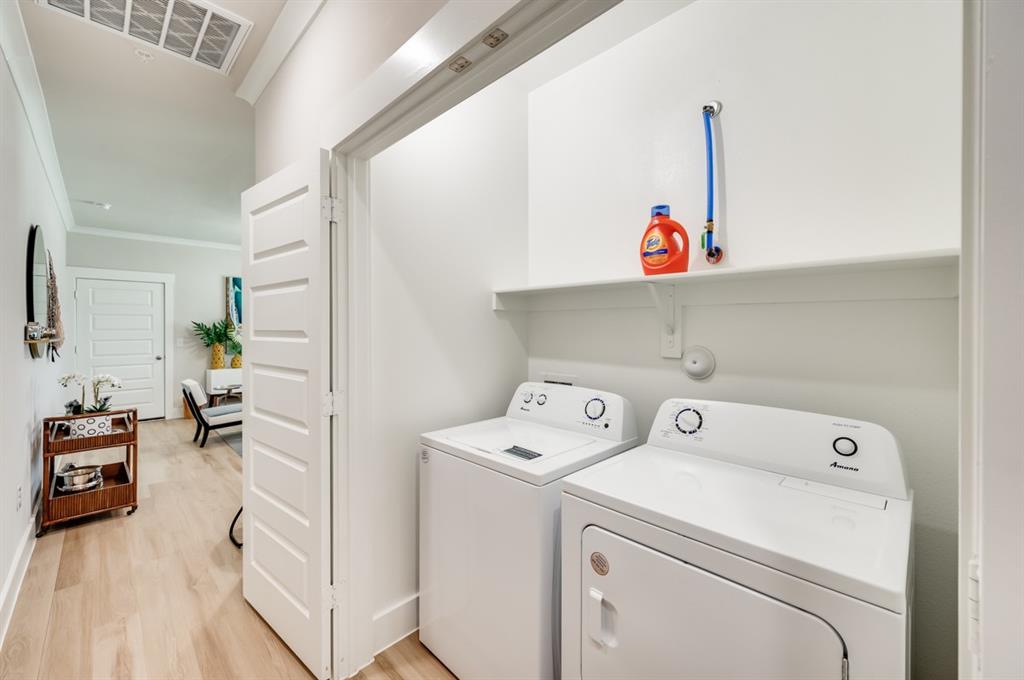 579 Lloyd's Road, Unit 1213A Little Elm, TX 75068 - Photo 12 of 34 a view of washer and dryer