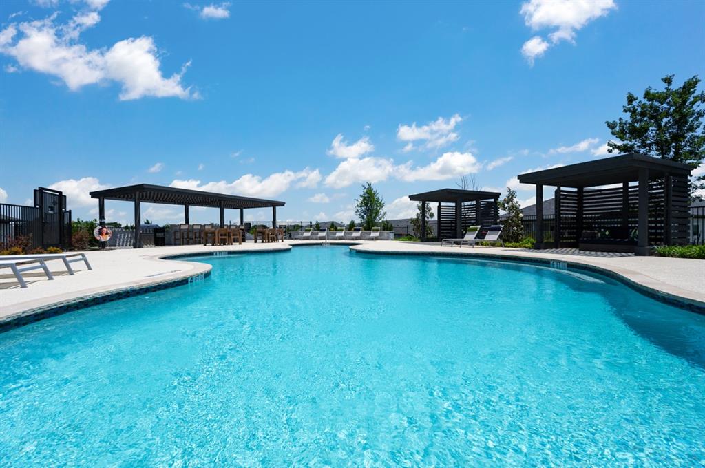 579 Lloyd's Road, Unit 1213A Little Elm, TX 75068 - Photo 20 of 34 a view of a swimming pool with an outdoor seating