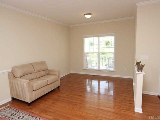 131 Locke Woods Road Raleigh, NC 27603 - Photo 2 of 18 a living room with furniture and a large window