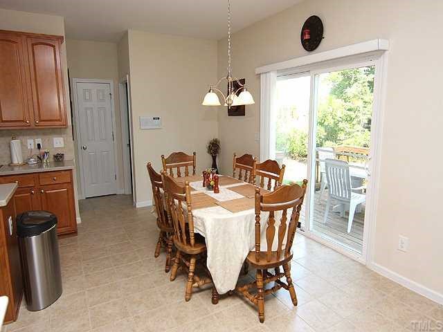 131 Locke Woods Road Raleigh, NC 27603 - Photo 5 of 18 a dining room with furniture and window