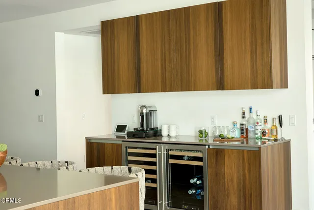 a bedroom with a bed and a table