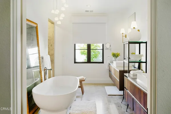 a view of a living room and a balcony